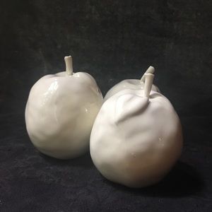 Ceramic fruit that is handmade of porcelain clay.